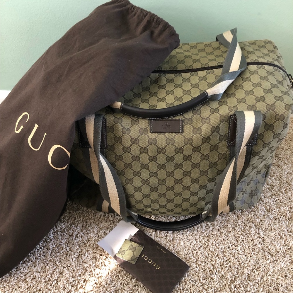 Gucci carry on luggage.